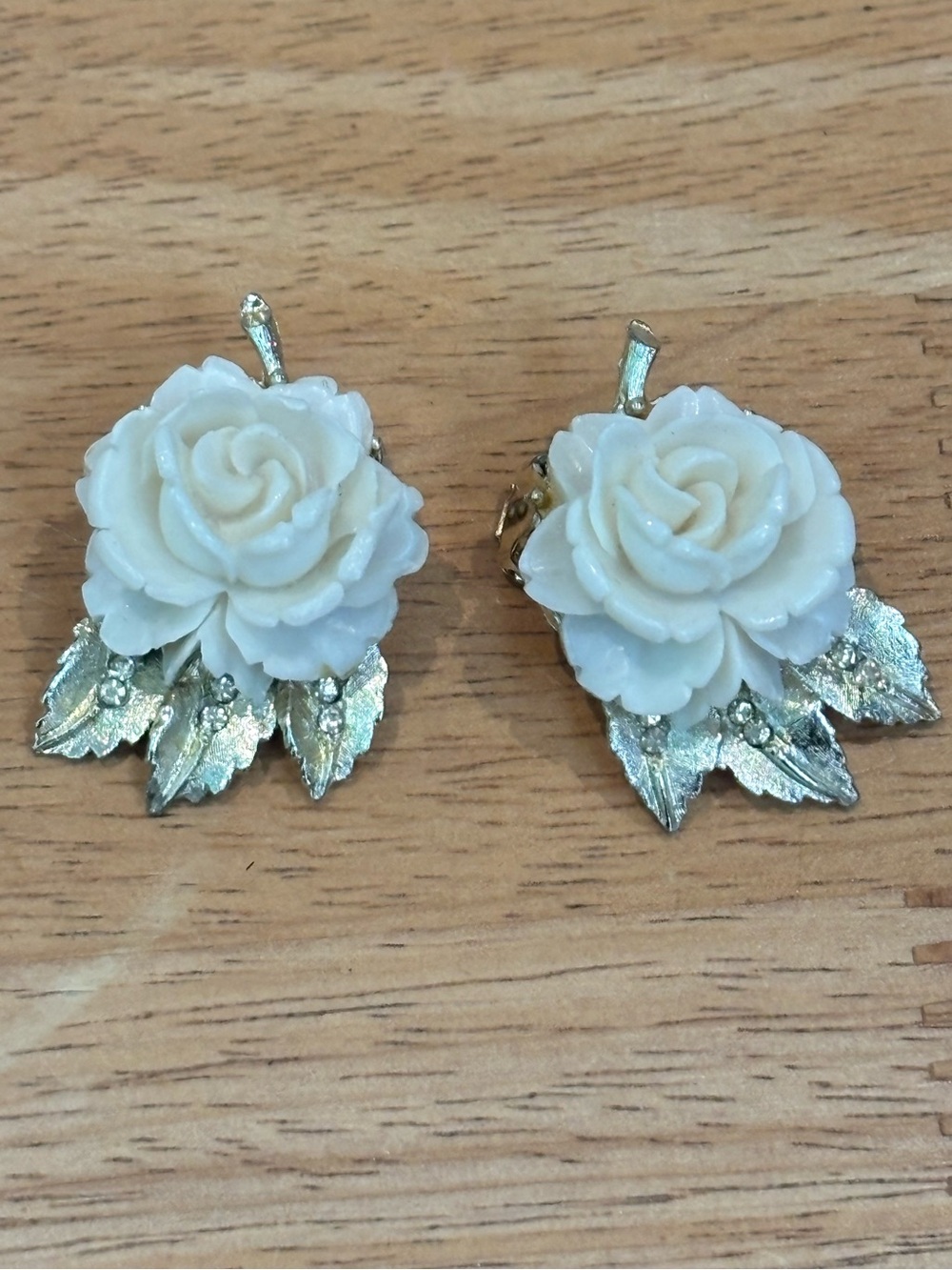 B.S.K. New York signed rose design meerschaum style gold tone clip earrings